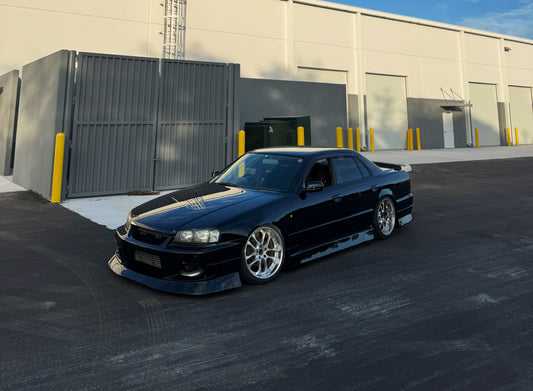 Origin Labo Nissan R34 4-Door Stream Rear Bumper - D72-RB